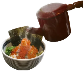 Hot dashi poured over a bowl for chazuke